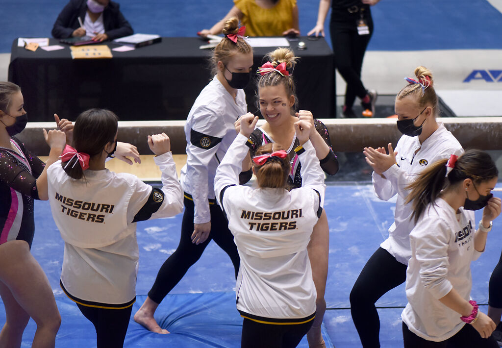 Gabrielle Gottula cheers with her teammates